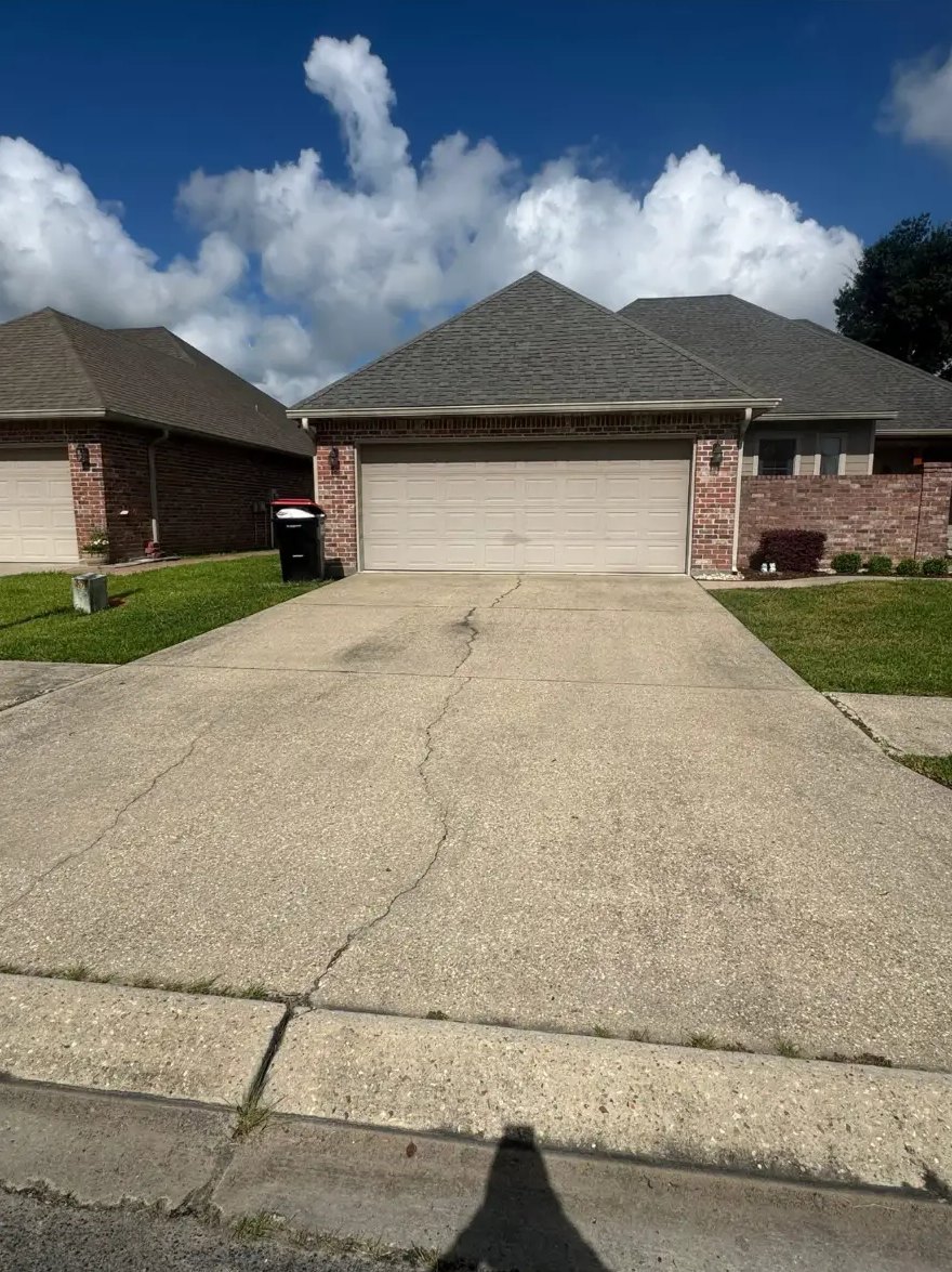 Concrete driveway — dirt & mildew washed out — before